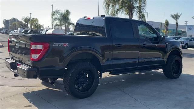 used 2021 Ford F-150 car, priced at $26,555