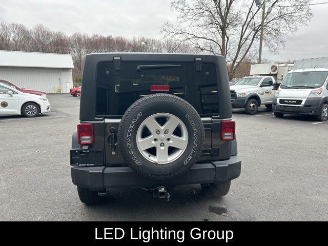 used 2018 Jeep Wrangler JK Unlimited car, priced at $20,999