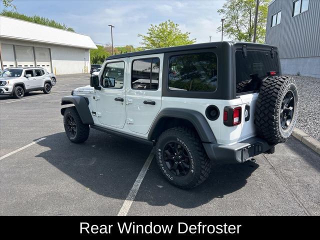 used 2021 Jeep Wrangler Unlimited car, priced at $31,449
