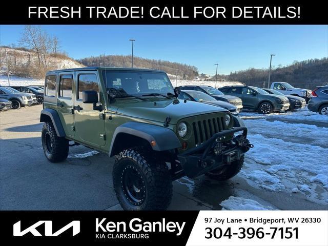 used 2013 Jeep Wrangler Unlimited car, priced at $15,902