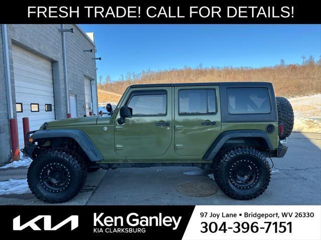 used 2013 Jeep Wrangler Unlimited car, priced at $15,902