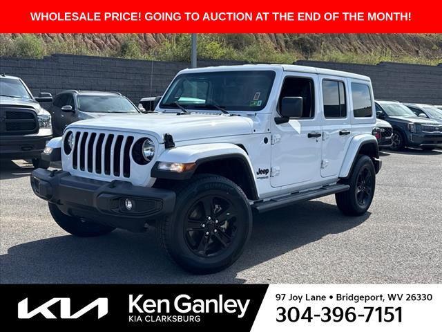 used 2021 Jeep Wrangler Unlimited car, priced at $33,592