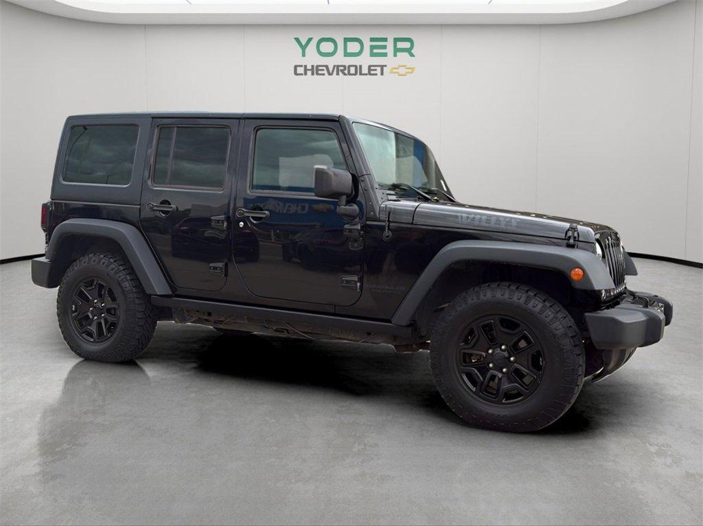 used 2015 Jeep Wrangler Unlimited car, priced at $17,299