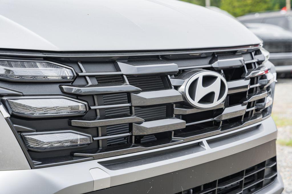 new 2025 Hyundai TUCSON Hybrid car, priced at $31,181