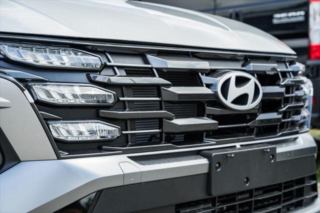 new 2025 Hyundai TUCSON Hybrid car, priced at $37,834