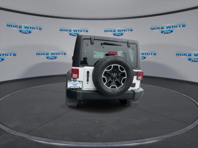 used 2016 Jeep Wrangler Unlimited car, priced at $19,058