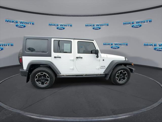 used 2016 Jeep Wrangler Unlimited car, priced at $19,058