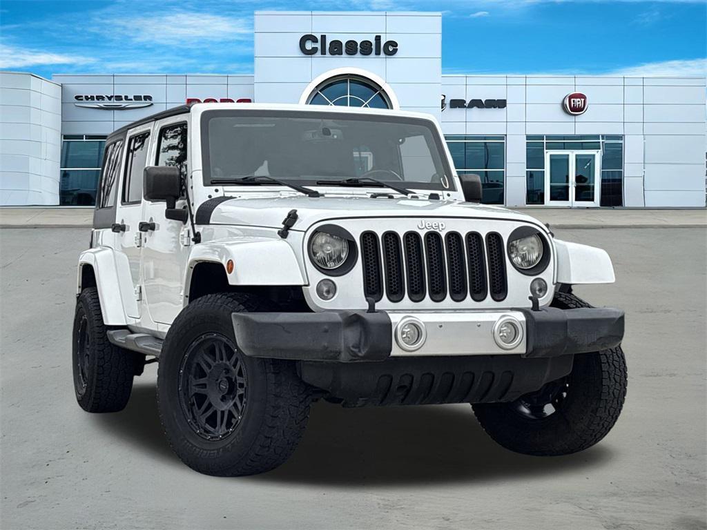 used 2014 Jeep Wrangler Unlimited car, priced at $19,792