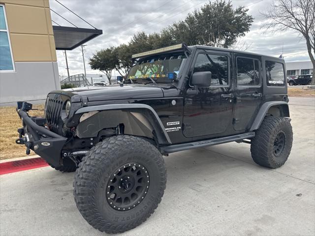 used 2013 Jeep Wrangler Unlimited car, priced at $21,991