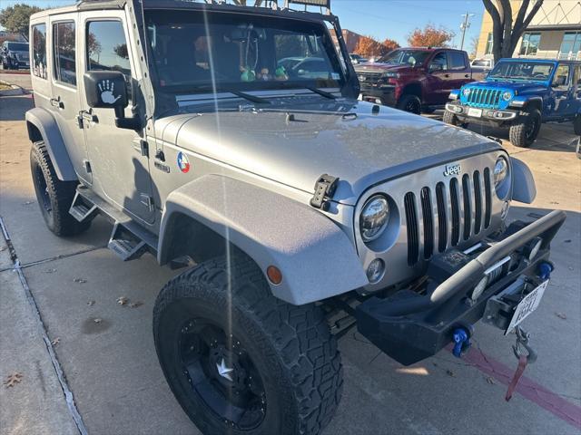 used 2014 Jeep Wrangler Unlimited car, priced at $23,491