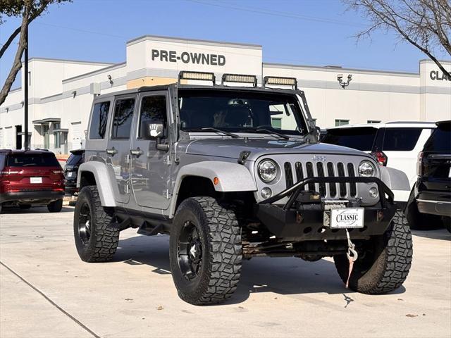 used 2014 Jeep Wrangler Unlimited car, priced at $20,792