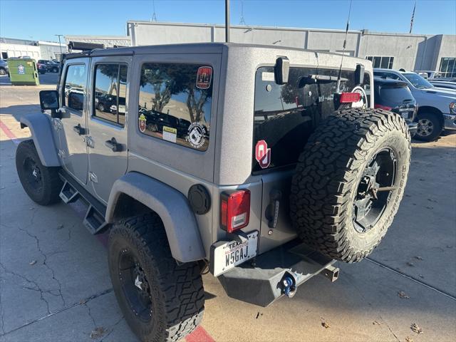 used 2014 Jeep Wrangler Unlimited car, priced at $23,491