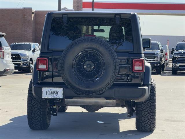 used 2023 Jeep Wrangler car, priced at $32,892