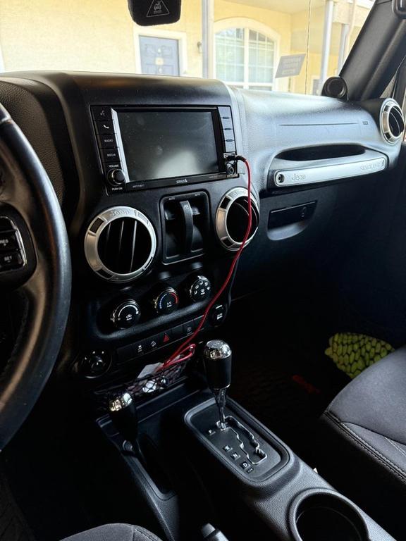 used 2014 Jeep Wrangler car, priced at $22,991