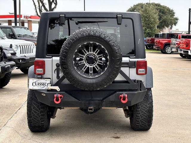 used 2015 Jeep Wrangler Unlimited car, priced at $23,991