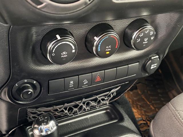 used 2015 Jeep Wrangler Unlimited car, priced at $23,991