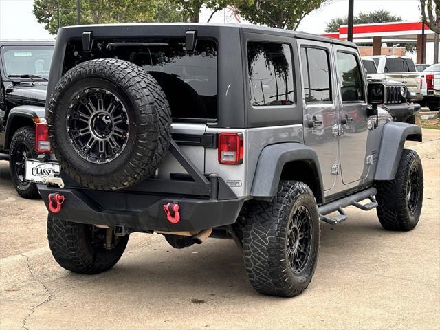 used 2015 Jeep Wrangler Unlimited car, priced at $23,991