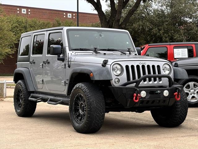 used 2015 Jeep Wrangler Unlimited car, priced at $23,991