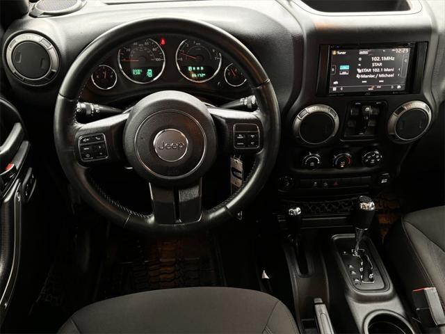 used 2015 Jeep Wrangler Unlimited car, priced at $23,991