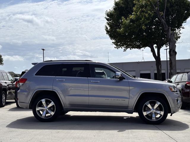used 2014 Jeep Grand Cherokee car, priced at $14,841