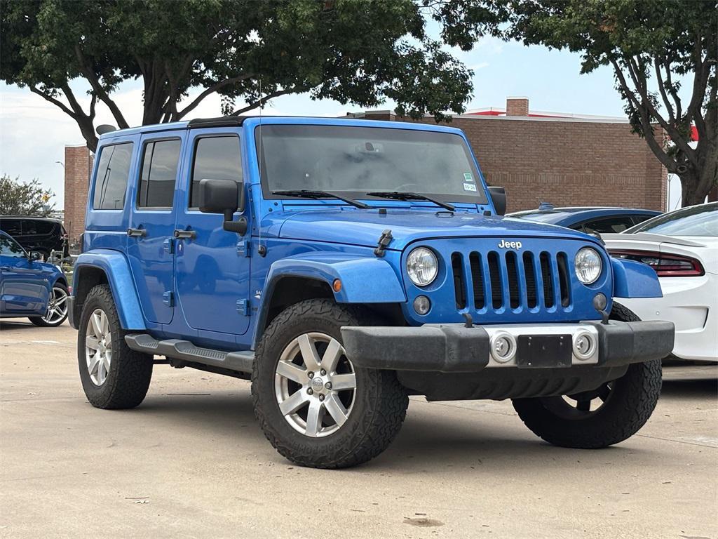 used 2015 Jeep Wrangler Unlimited car, priced at $15,991