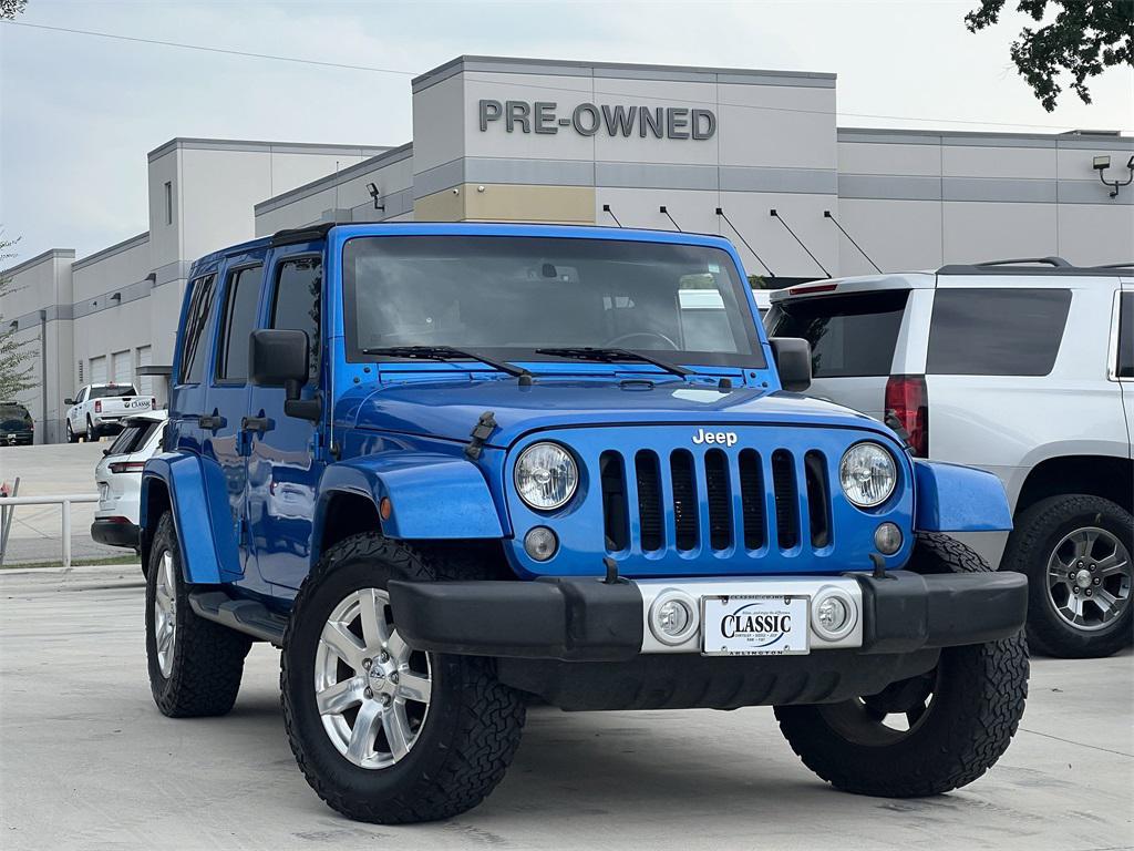 used 2015 Jeep Wrangler Unlimited car, priced at $16,652