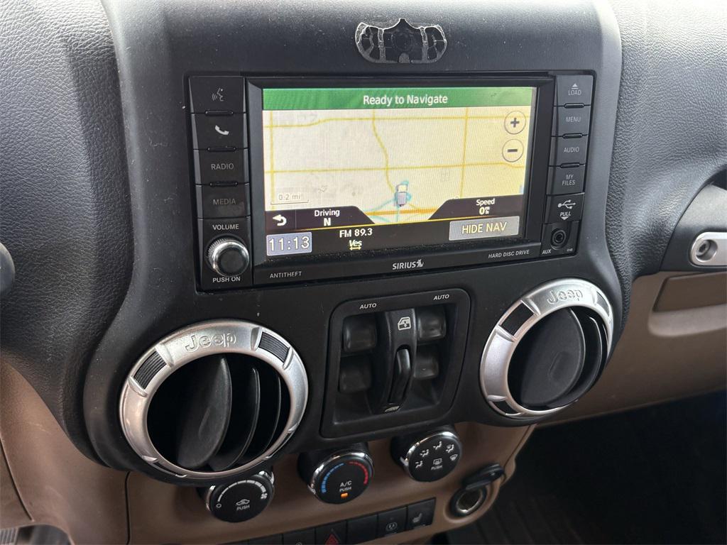 used 2015 Jeep Wrangler Unlimited car, priced at $15,991