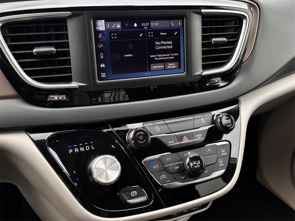 used 2023 Chrysler Voyager car, priced at $21,259