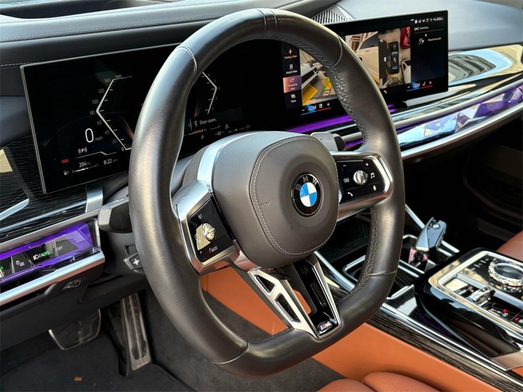 used 2024 BMW 740 car, priced at $74,995