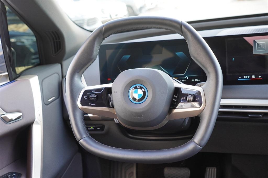 used 2024 BMW iX car, priced at $63,999