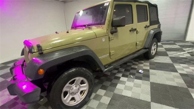 used 2013 Jeep Wrangler Unlimited car, priced at $18,888