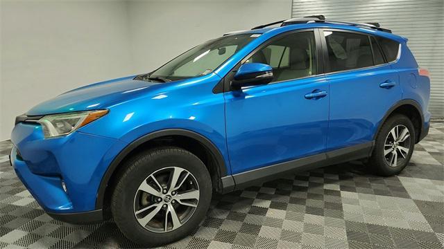 used 2018 Toyota RAV4 car, priced at $17,995