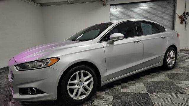 used 2013 Ford Fusion car, priced at $7,800