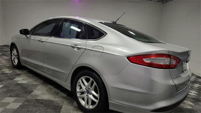 used 2013 Ford Fusion car, priced at $7,800