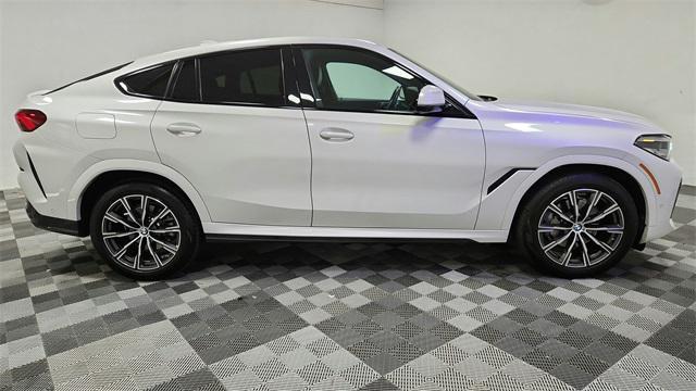 used 2023 BMW X6 car, priced at $58,888