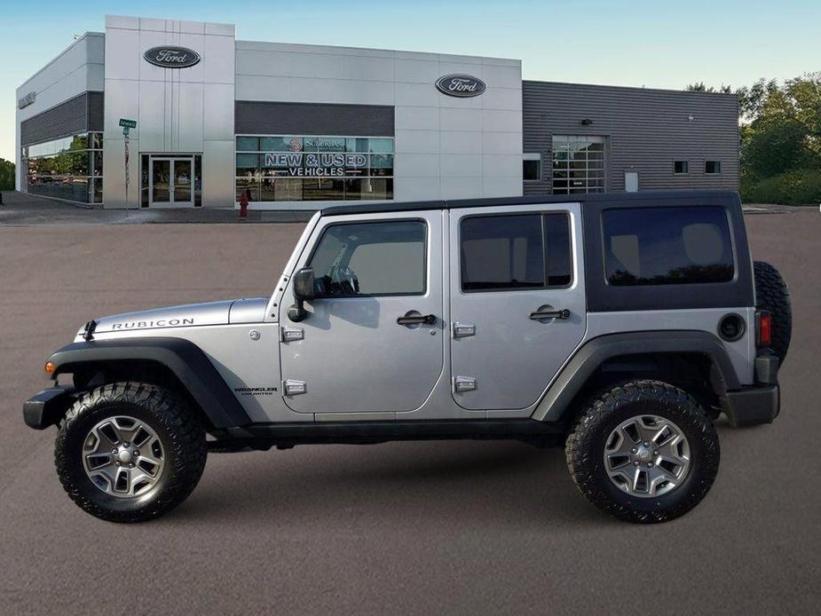 used 2014 Jeep Wrangler Unlimited car, priced at $20,395