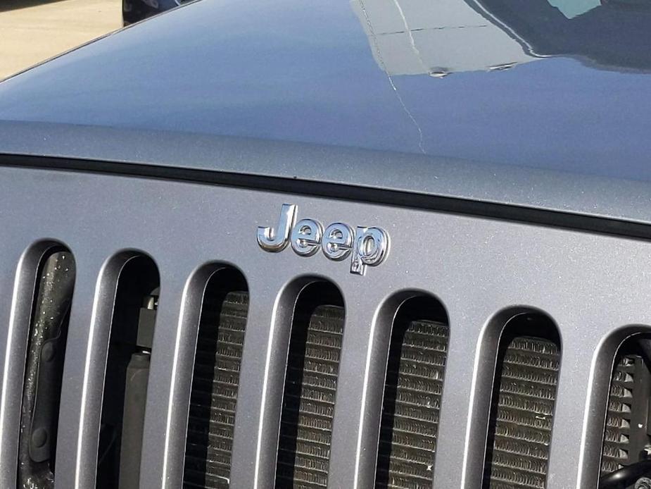 used 2014 Jeep Wrangler Unlimited car, priced at $20,395