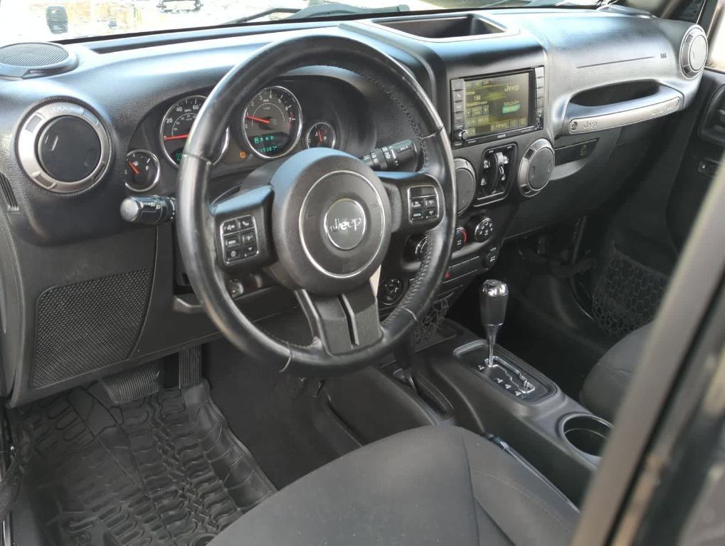 used 2015 Jeep Wrangler Unlimited car, priced at $12,995