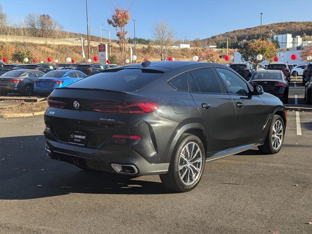 used 2023 BMW X6 car, priced at $57,990