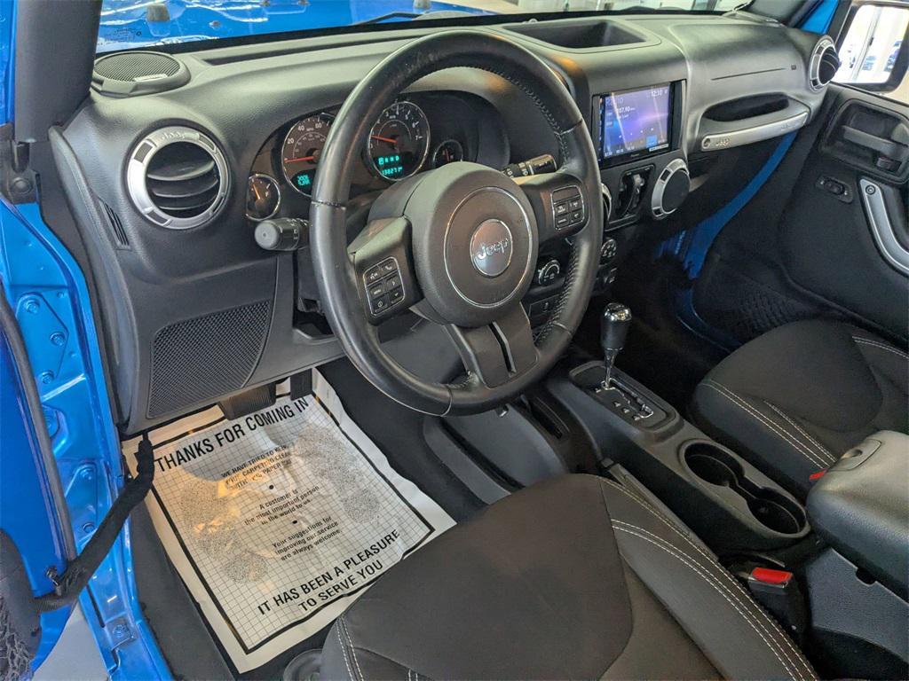 used 2015 Jeep Wrangler Unlimited car, priced at $13,990
