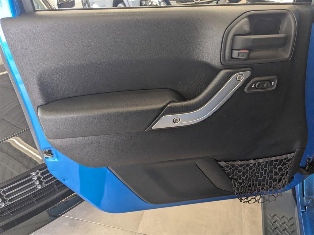 used 2015 Jeep Wrangler Unlimited car, priced at $13,990