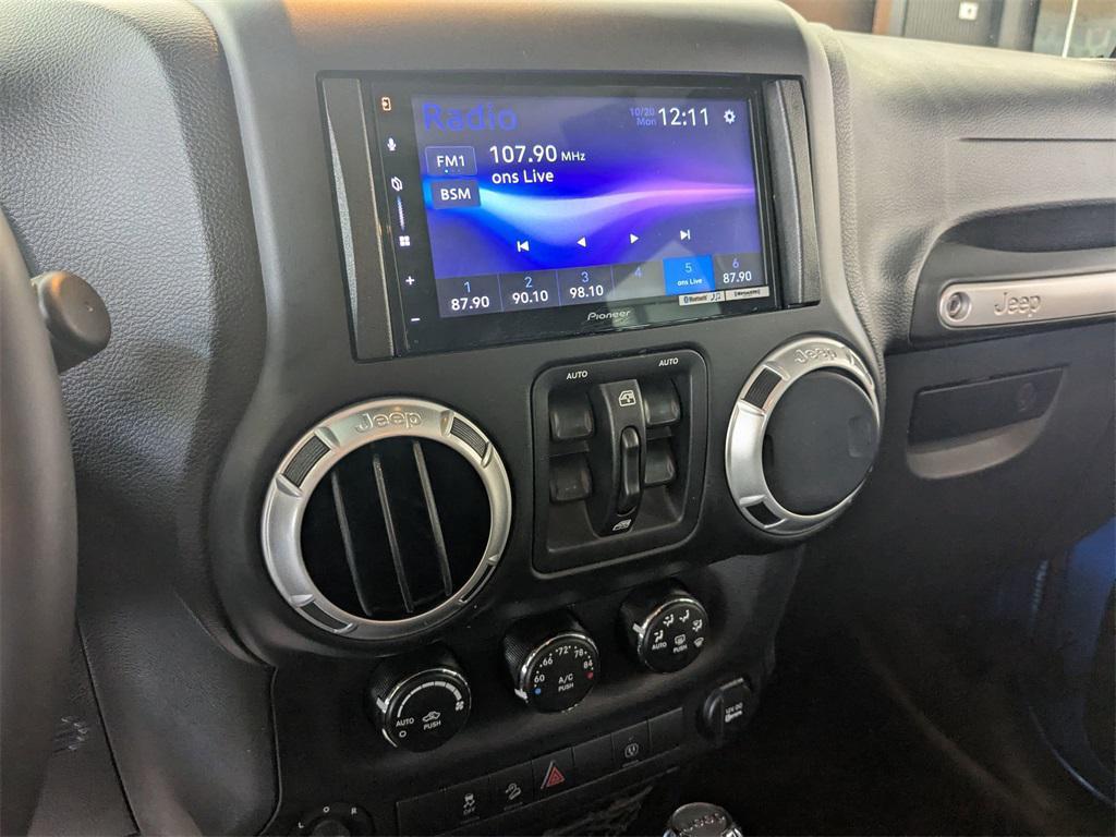 used 2015 Jeep Wrangler Unlimited car, priced at $13,990