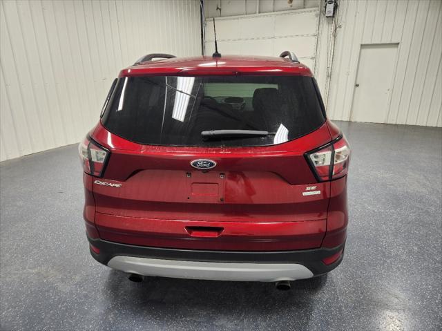 used 2018 Ford Escape car, priced at $8,888