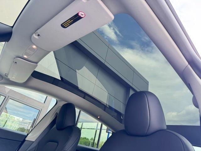used 2025 Tesla Model Y car, priced at $41,999