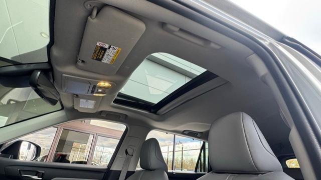 used 2022 Toyota Highlander Hybrid car, priced at $36,899