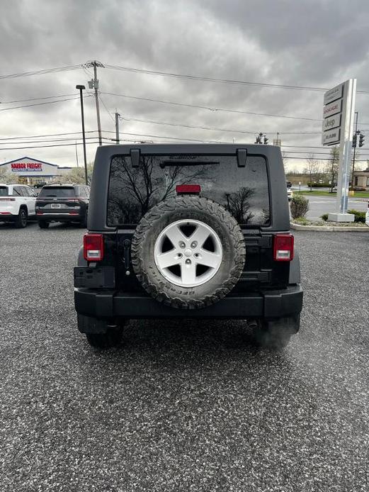 used 2018 Jeep Wrangler JK Unlimited car, priced at $23,799