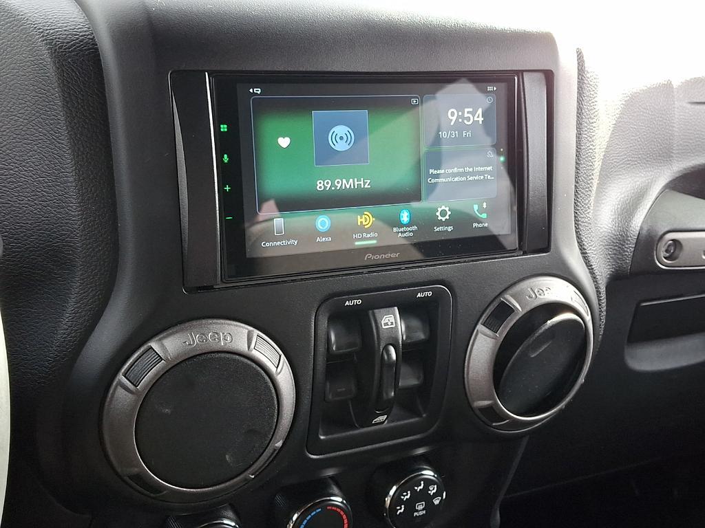 used 2016 Jeep Wrangler Unlimited car, priced at $18,067