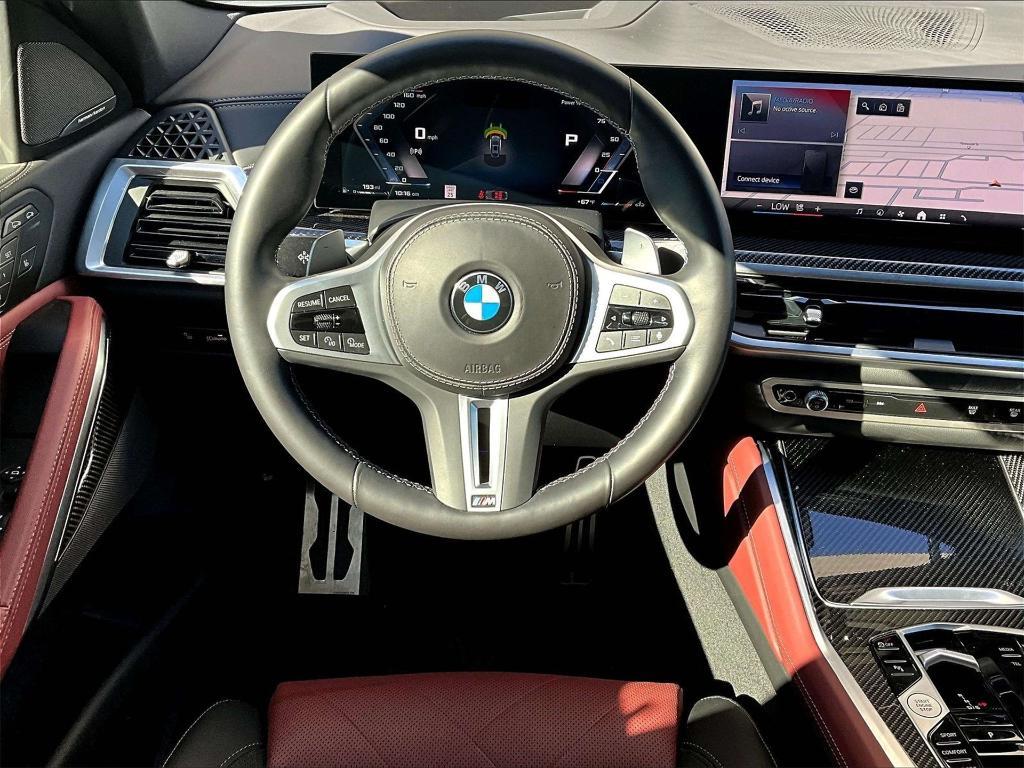 used 2025 BMW X6 car, priced at $89,000