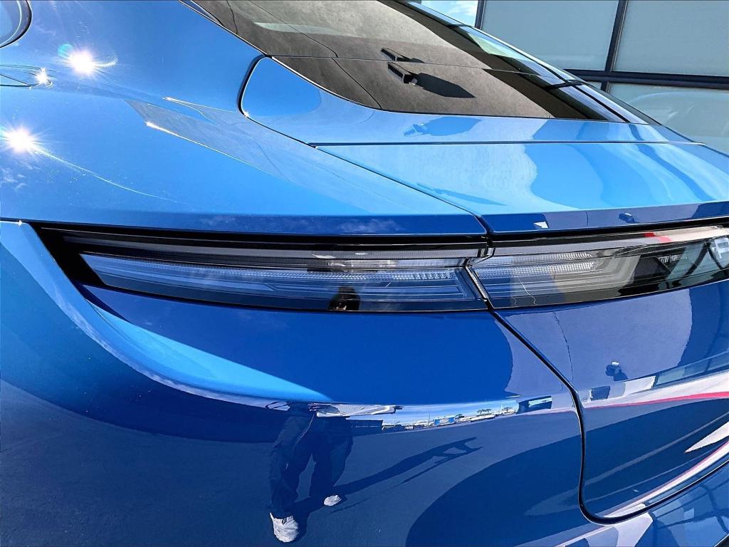 new 2026 Porsche Taycan car, priced at $127,130