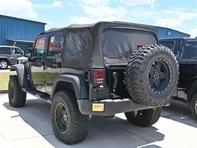 used 2015 Jeep Wrangler Unlimited car, priced at $20,805